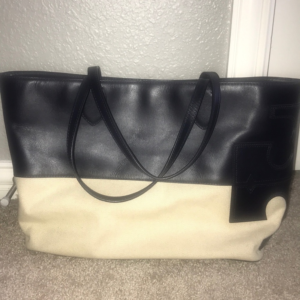 Tory Burch’s Canvas Stacked T East West Tote